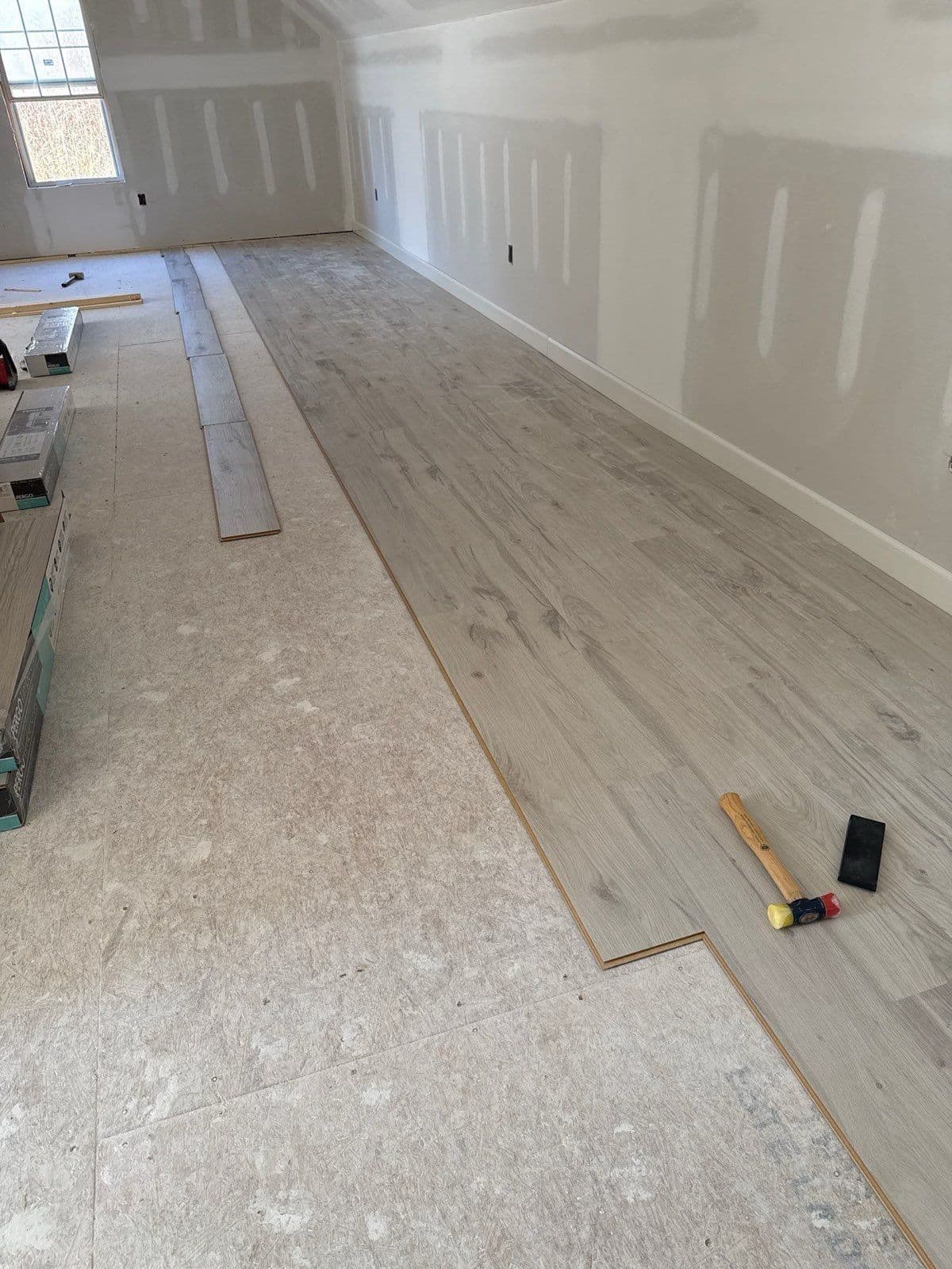 Attic Makeover in Covington TN: Stunning Pergo Flooring Installation