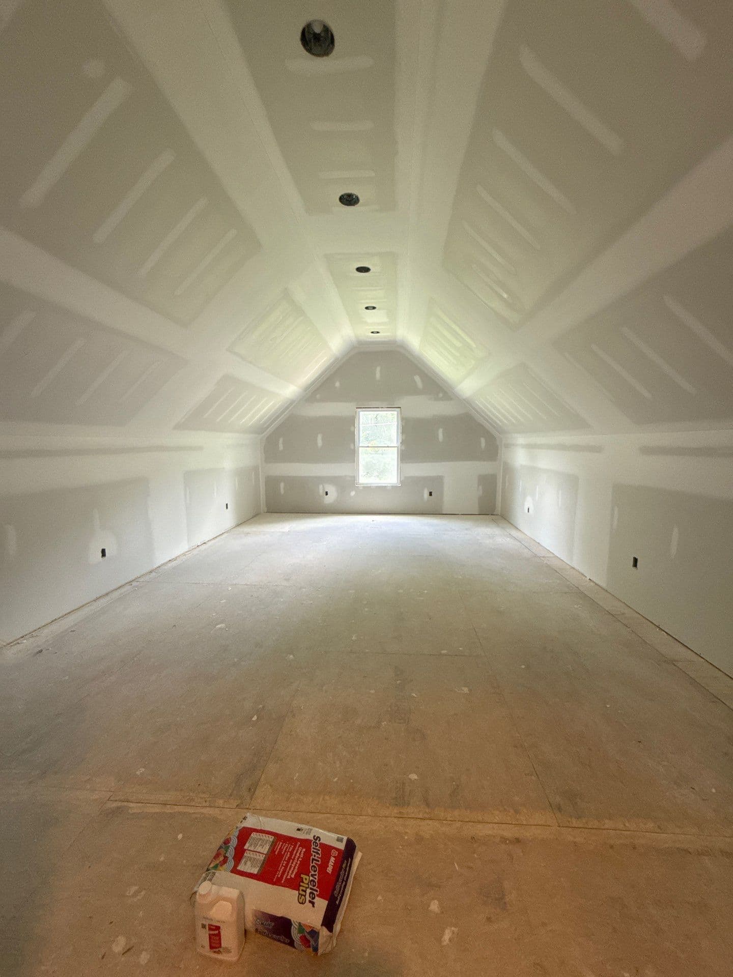 Attic Finish-Out in Progress - Drywall Done, Flooring Up Next image